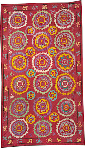 An Uzbeck Suzani  size approximately 7ft. 3in. x 12ft. 2in.