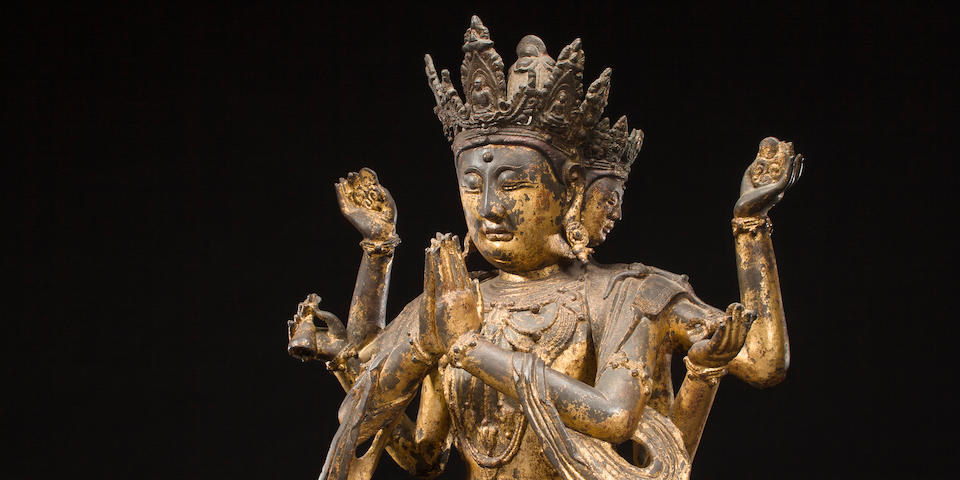 A large and very rare gilt lacquered bronze figure of Guanyin Late Ming dynasty