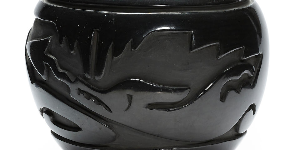 A Santa Clara carved blackware jar