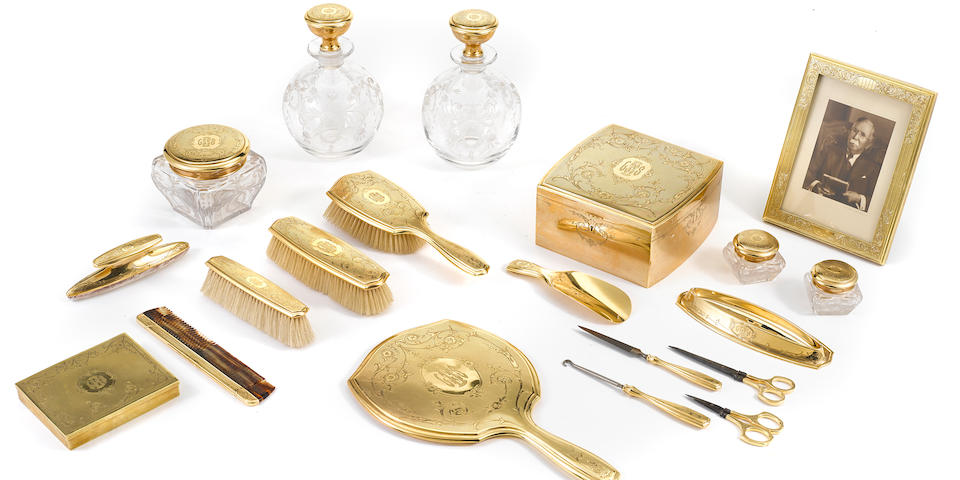 An American  14K yellow gold and clear-glass eighteen-piece vanity service by Gorham Mfg. Co., Providence, RI, early 20th century