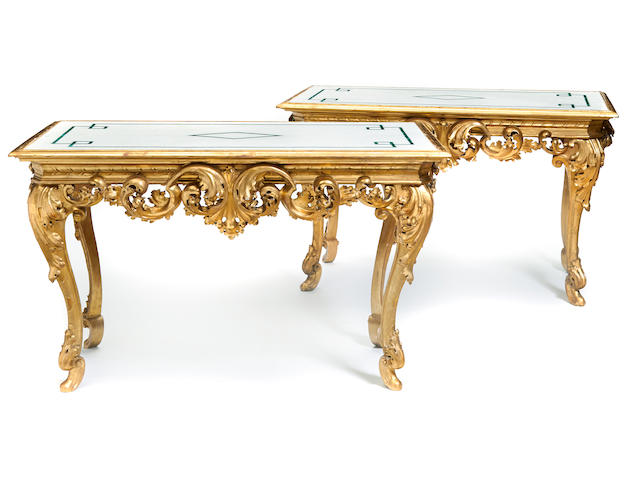 A pair of Italian Rococo style carved giltwood center tables late 19th century