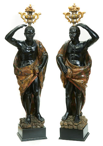 A pair of Venetian Rococo style polychrome decorated and ebonized figures second half 19th century
