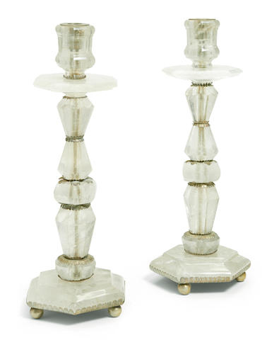 A pair of Neoclassical style silvered metal and rock crystal candlesticks