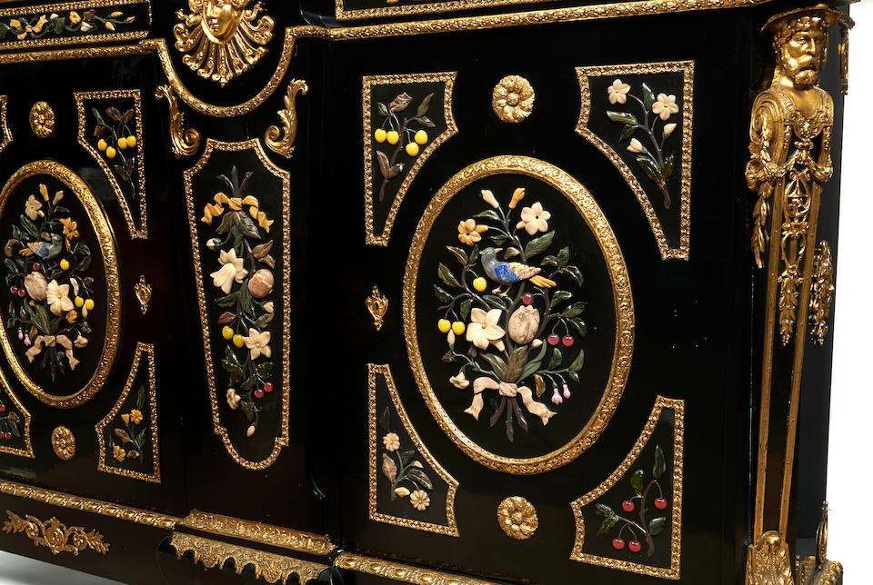 An imposing Napoleon III gilt bronze mounted and polished hardstone ebonized cabinet third quarter 19th century