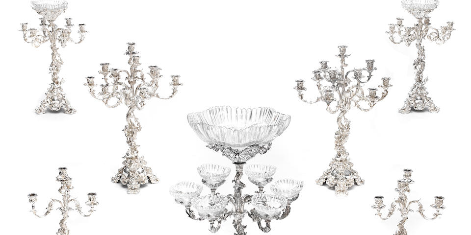 A large Victorian  silver-plated Rococo style seven-piece table garniture no maker's mark evident,  late 19th century