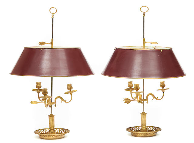 A pair of Louis XVI style gilt bronze, steel and painted t&#244;le bouillotte lamps