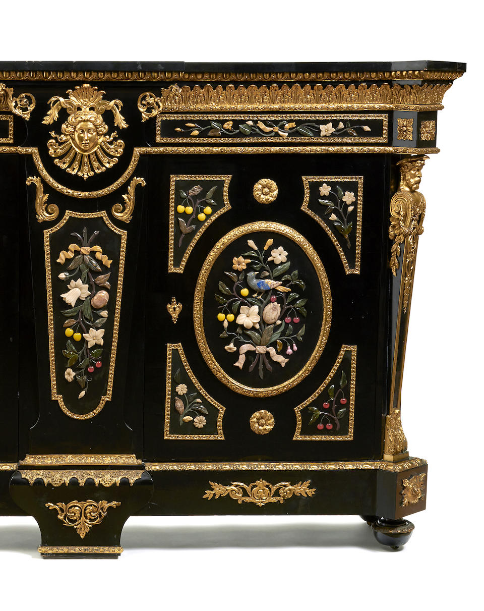 An imposing Napoleon III gilt bronze mounted and polished hardstone ebonized cabinet third quarter 19th century
