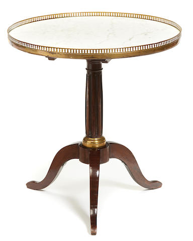 A Louis XVI brass mounted mahogany bouillotte table fourth quarter 18th century