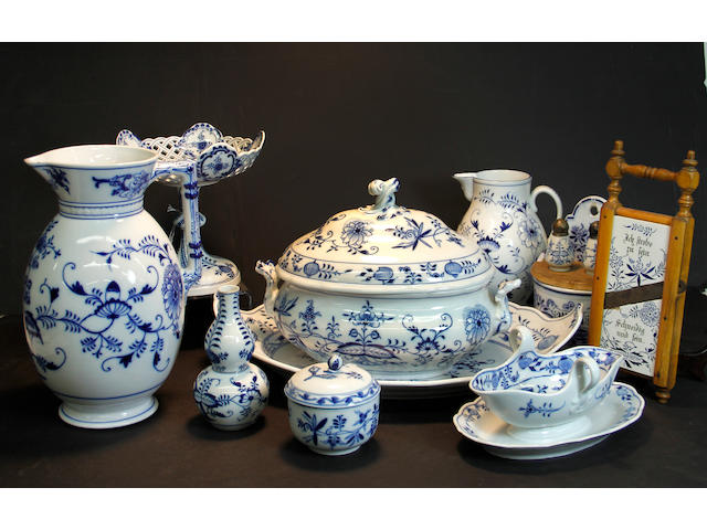 A large Meissen and C. Teichert  porcelain assembled dinner service in the Blue Onion pattern