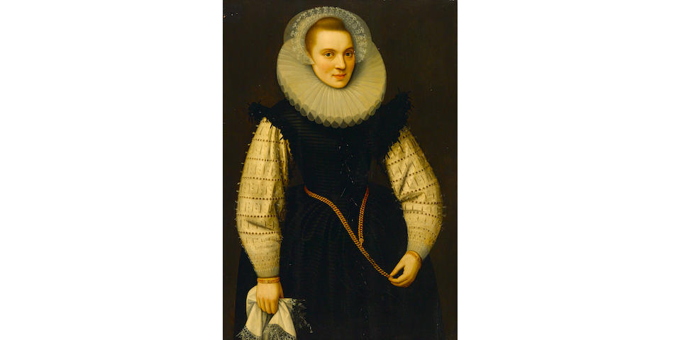 Circle of Gortzius Geldorp (Louvain 1553-1618 Cologne) A portrait of a lady, three-quarter length, holding a handkerchief in her right hand, and wearing matching gold bracelets and an ornate gold chain about her waist 14 1/2 x 28 3/4in (103 x 73cm)