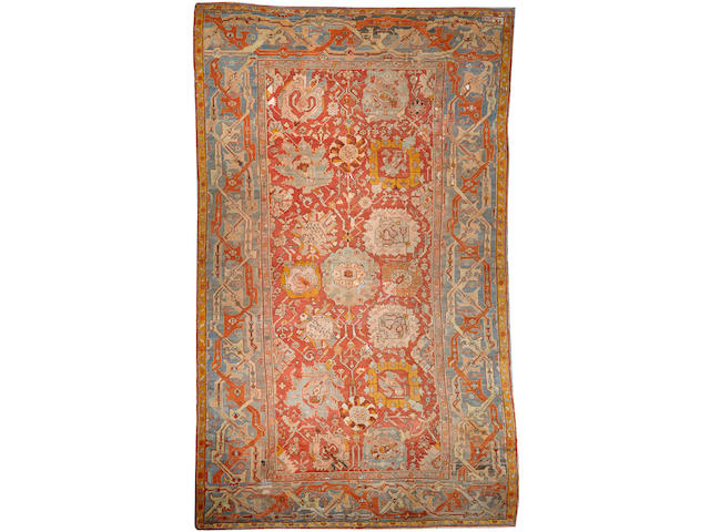 An Oushak carpet West Anatolia size approximately 11ft. 7in. x 19ft. 2in.