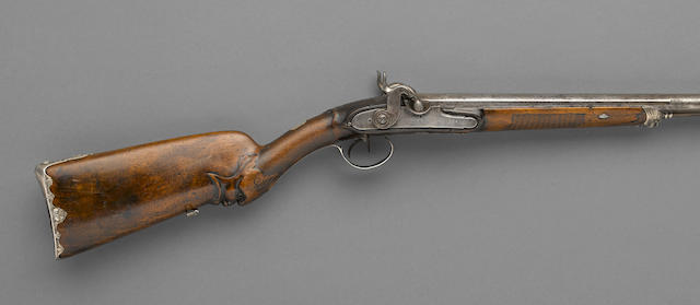 A silver-mounted French double barrel percussion shotgun by Boutet