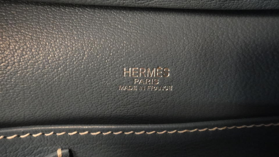 Bonhams : An Hermès Blue Jean leather Sac Envi handbag