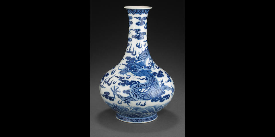 A blue and white bottle vase with dragons and clouds Jiaqing mark, late Qing dynasty