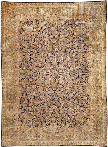 A Kerman carpet South Central Persia size approximately 9ft. 7in. x 13ft. 2in.