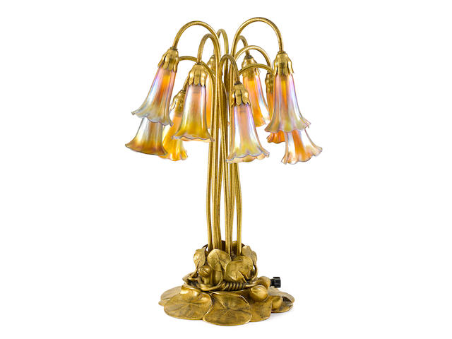 A Tiffany Studios Favrile glass and gilt bronze ten light Lily lamp 1899-1918