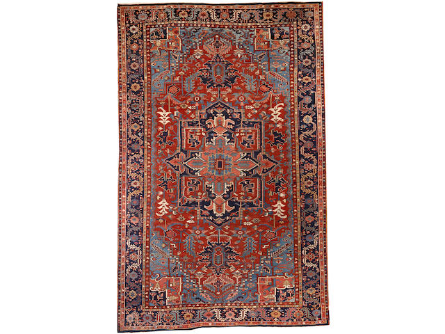 A Heriz carpet Northwest Persia size approximately 9ft. 10in. x 15ft. 3in.