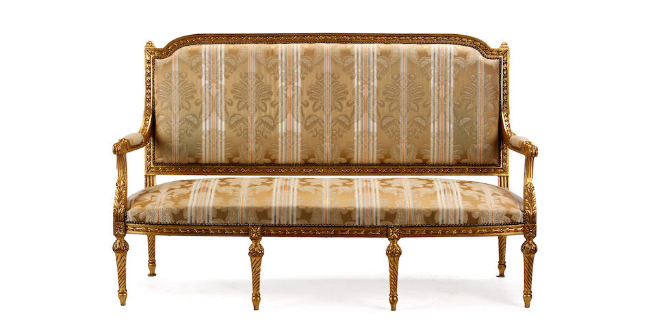 A Louis XVI style giltwood salon suite late 19th/early 20th century