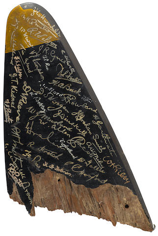 RAF DEBDEN ROLL OF HONOR: A section of a Hawker Hurricane propellor tip signed in paint by the RAF pilots on the base. 1939-42. 23 x 12in (58 x 30cm)