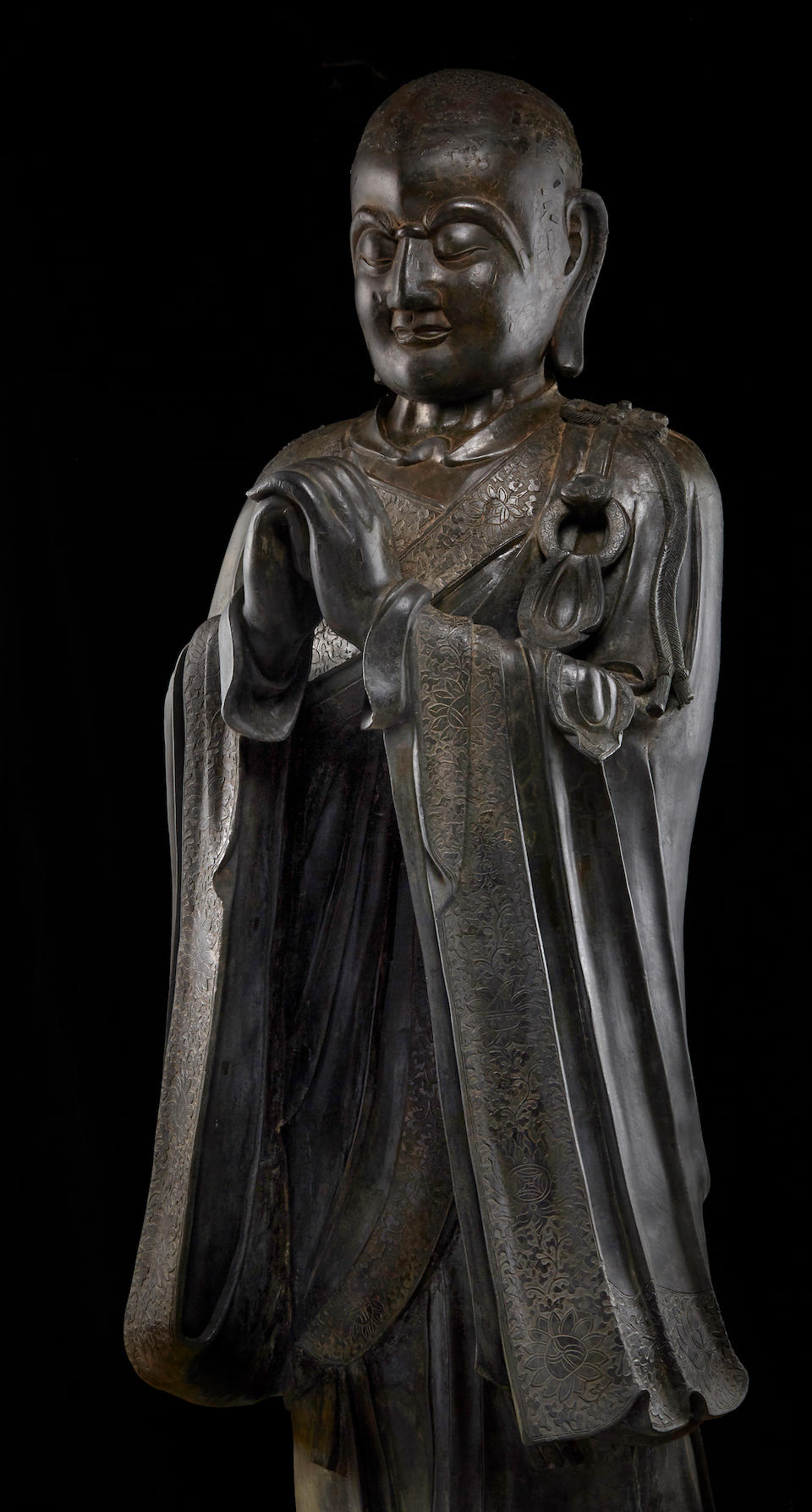 A rare monumental bronze figure of Mahakasyapa Ming dynasty