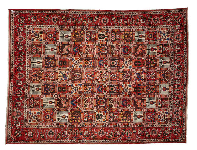 A Bakhtiari carpet size approximately 8ft. 10in. x 11ft. 8in.