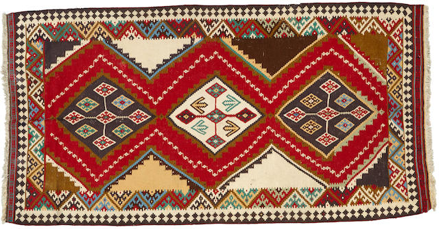 A Qashqai rug  size approximately 4ft. 10in. x 9ft. 2in.