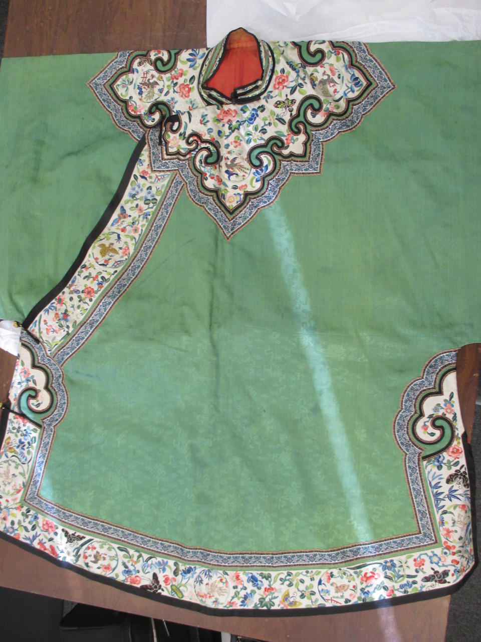 Bonhams : A green silk brocade woman's side-opening coat with ...