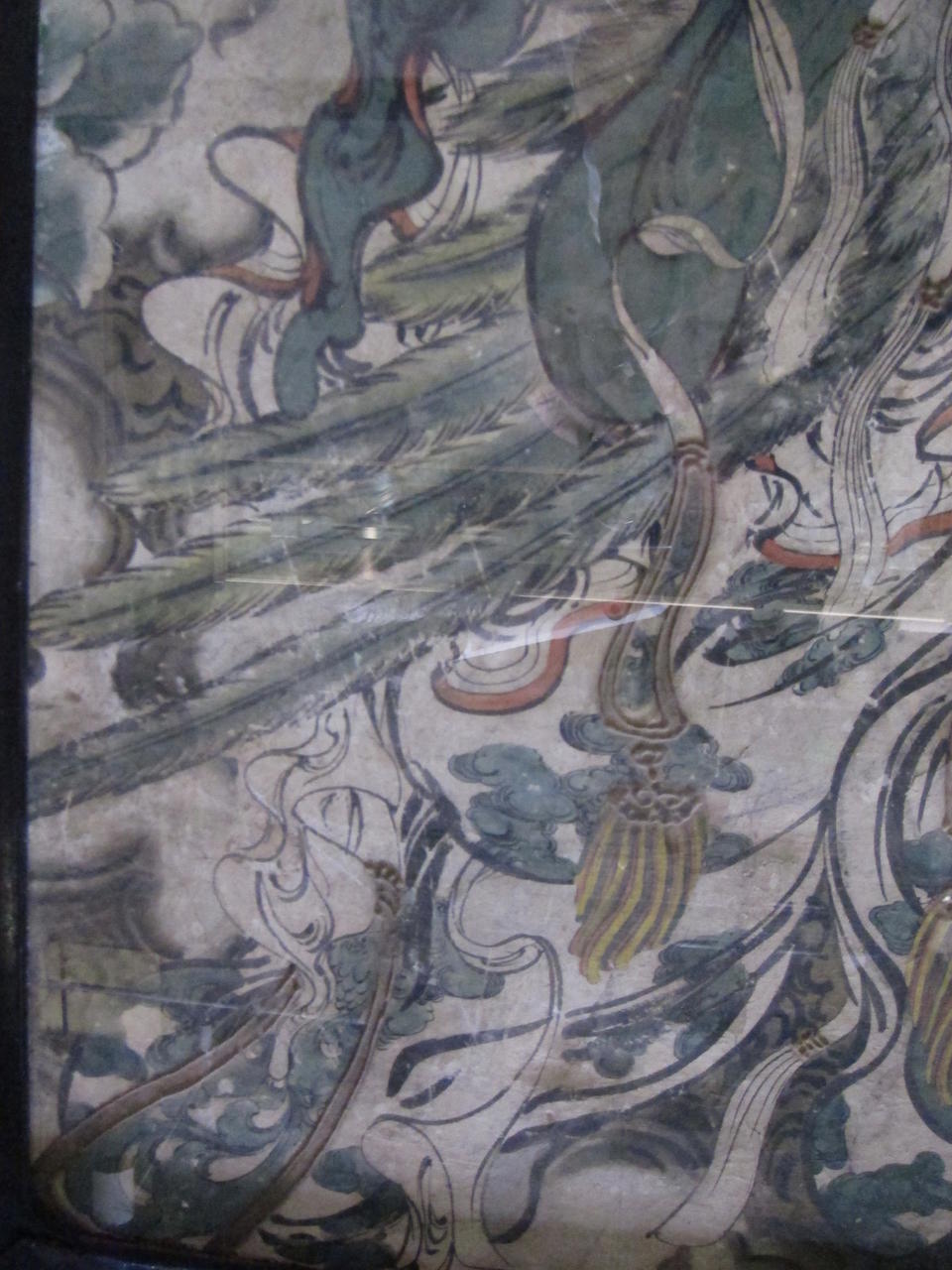 A fresco panel depicting a Buddhist celestial