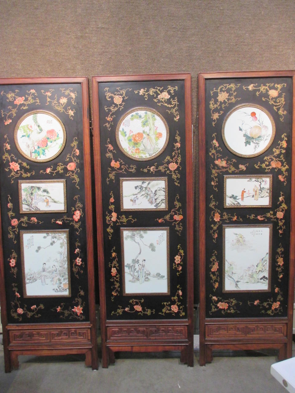 A six-panel mixed wood floor screen inlaid with porcelain plaques Late Qing/Republic period elements