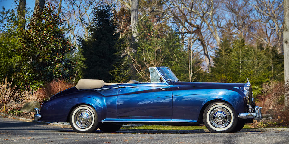 <i>Original left hand drive, U.S. delivery</i><BR /><B>1961 ROLLS-ROYCE  SILVER CLOUD II 'ADAPTATION' DROPHEAD COUPE<BR />Coachwork by H.J. Mulliner<br /></B><BR />Chassis no. LSXC 173<BR />Engine no. 451 CS