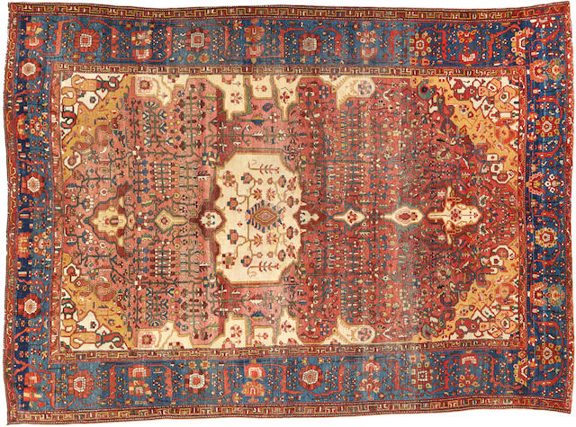A Fereghan Sarouk carpet Central Persia size approximately 8ft. 3in. x 11ft. 3in.