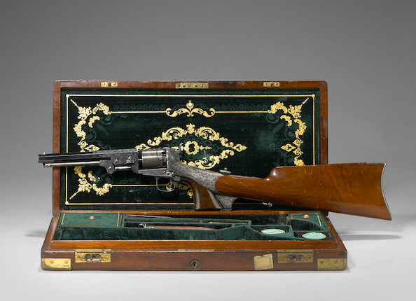 An engraved Colt Model 1851 Navy percussion revolver with shoulder stock in deluxe casing image 2