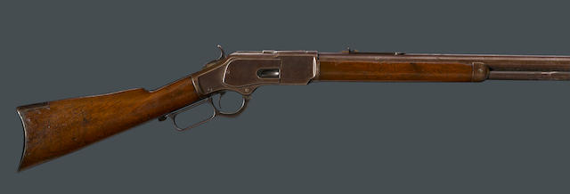 A Winchester Model 1873 lever action rifle