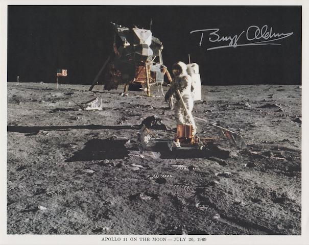 ALDRIN WITH LUNAR EXPERIMENTS Color photolithograph, 8 x 10 inches, with NASA descriptive text along the lower border and on verso.