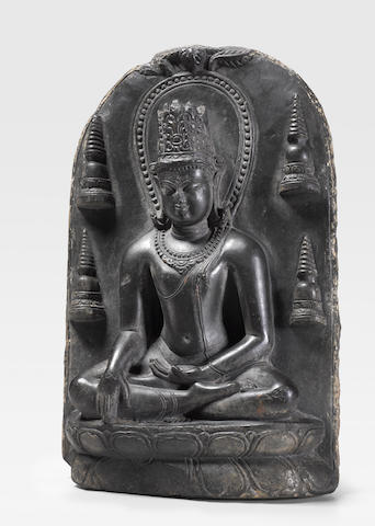 A BLACKSTONE STELE OF CROWNED BUDDHA NORTHEASTERN INDIA, PALA PERIOD, 10TH CENTURY