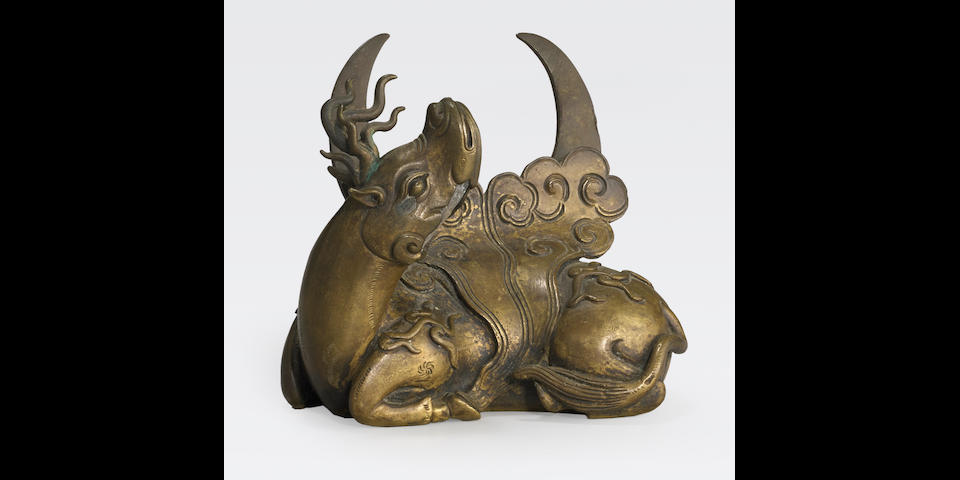 A gilt bronze mirror holder in the shape of a Qilin Qing dynasty