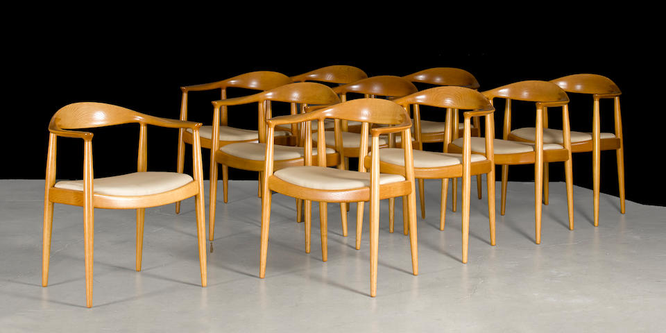 Hans Wegner (1914-2007) Ten The Chair (Round) chairsJohannes Hansen, oak, upholstery, branded JOHANNES HANSEN COPENHAGEN DENMARK JHheight 30 3/8in (77cm); width 24 3/4in (63cm); depth 18 1/2in (47cm)