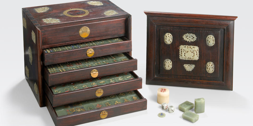 An unusual jade mah jong set in a wood storage case with applied jade plaque decoration Republic period