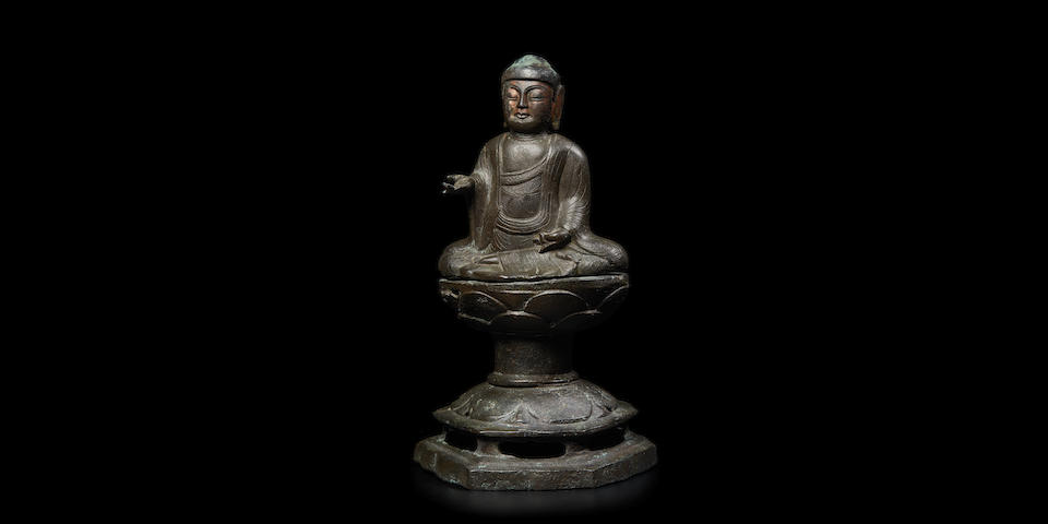 An extremely rare gilt bronze figure of a Buddha on a stand Silla dynasty (57 BCE-935 CE), 10th century