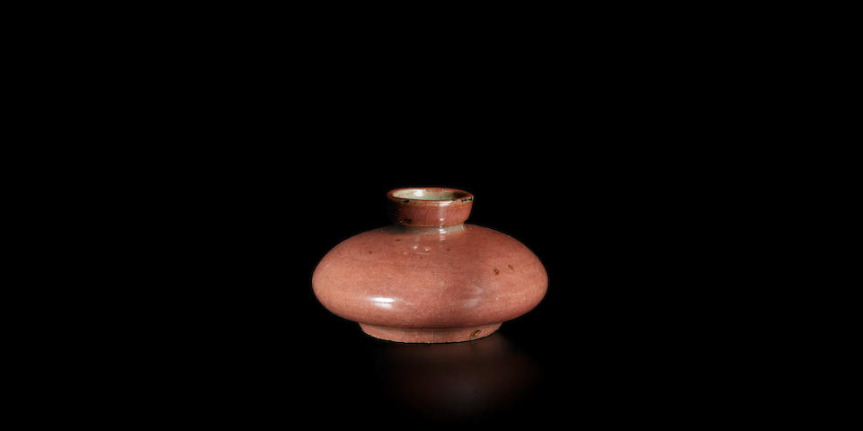 A small celadon copper-red glazed cosmetic stoneware jar Goryeo dynasty (918-1392), 12th century