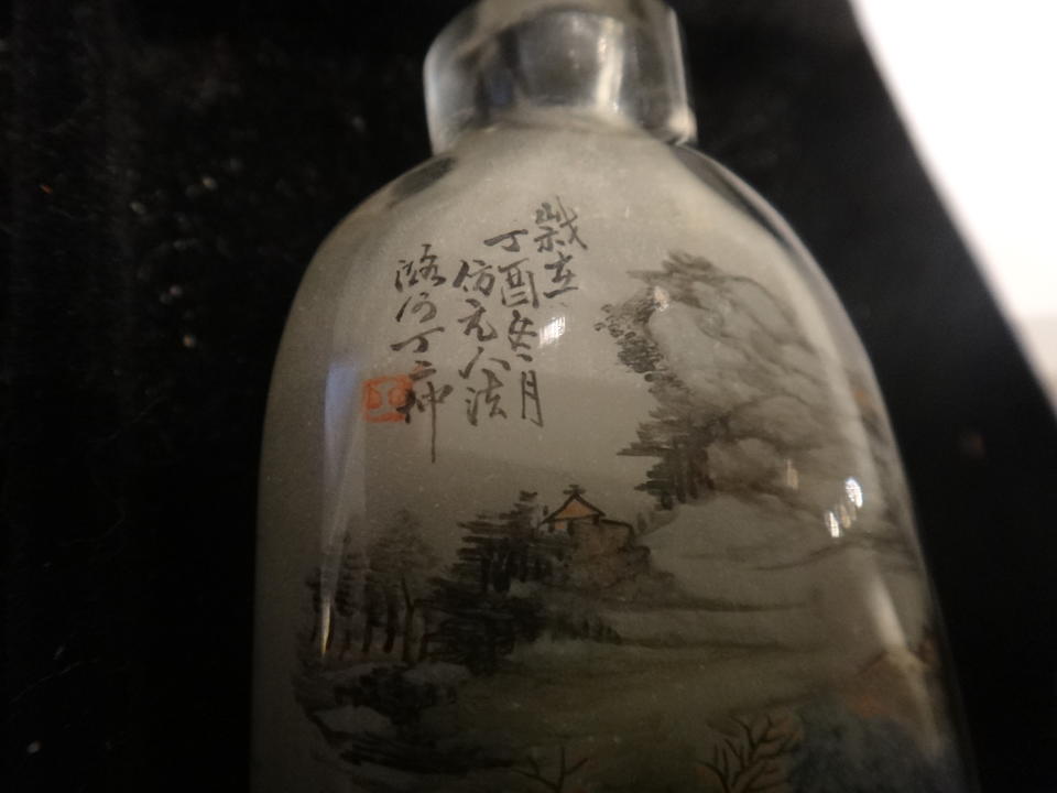 A fine and rare inside painted glass snuff bottle Ding Erzhong, 1897