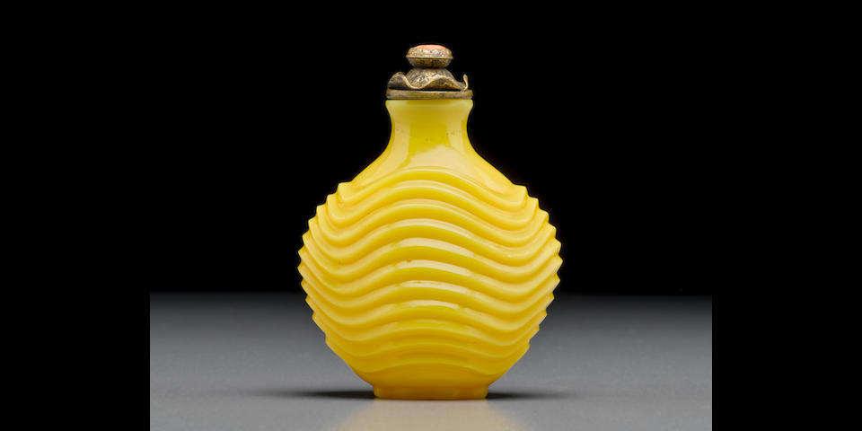 A rare yellow glass snuff bottle with a waving rib design Imperial, Palace Workshops, Beijing, 1750-1840