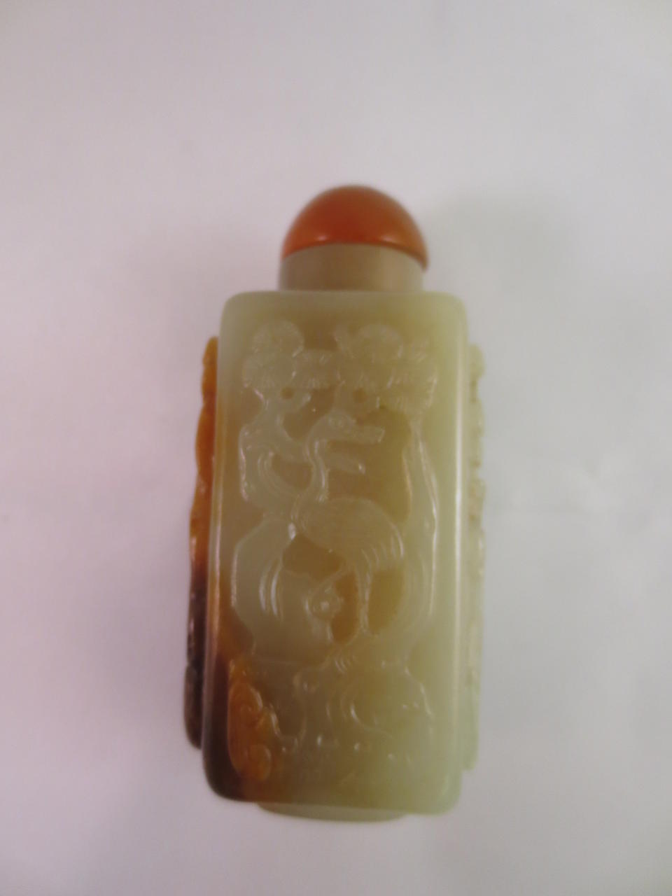 A yellow and russet jade snuff bottle 1820-1880