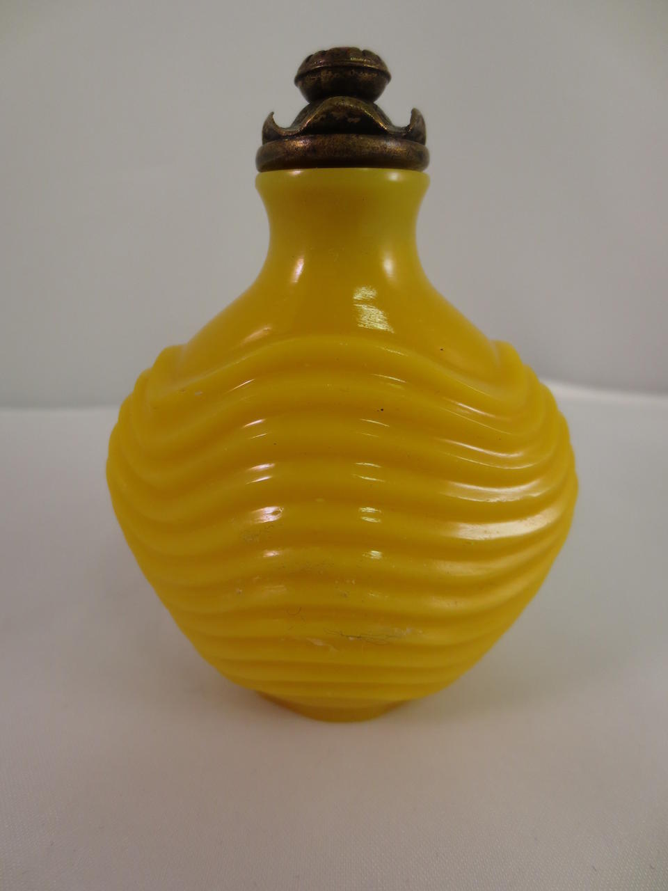 A rare yellow glass snuff bottle with a waving rib design Imperial, Palace Workshops, Beijing, 1750-1840