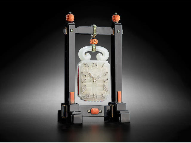 Cartier.  A very fine diamond-set jade, onyx, coral, beryl and gold Chinoiserie desk clockAttributed to Maurice Couet, Paris, movement signed by European Watch & Clock Co. Circa 1927