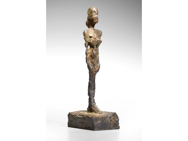 Alberto Giacometti (1901-1966) Figurine [Femme debout au chignon] 8 7/8 in (22.3 cm) (height) (Conceived circa 1953-1954 and cast in 1980 in an edition of eight plus one artist's proof)