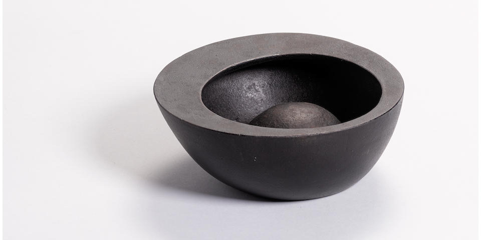 Attributed to Isamu Noguchi (1904-1988) Rare Bowlby OOI KOJO for Bonniers designed circa 1944-48, executed 1950spatinated iron stamped 'Bonniers Japan'height 2 5/8in (6cm); diameter 6 3/4in (17cm)