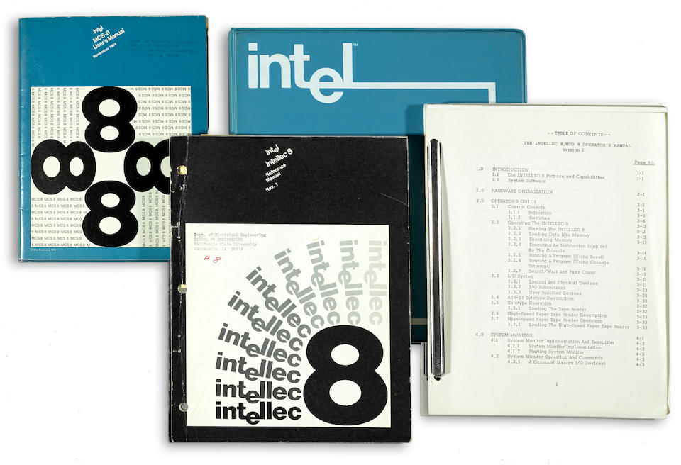 INTEL INTELLEC-8 8-Bit Microcomputer, 1973, aluminum case with hinged top and magnetic closures, face plate with 48 LEDs, 31 switches, ZIF socket and key switch; containing 7 modules, cooling fan, 4 multi-pin female connectors at back,