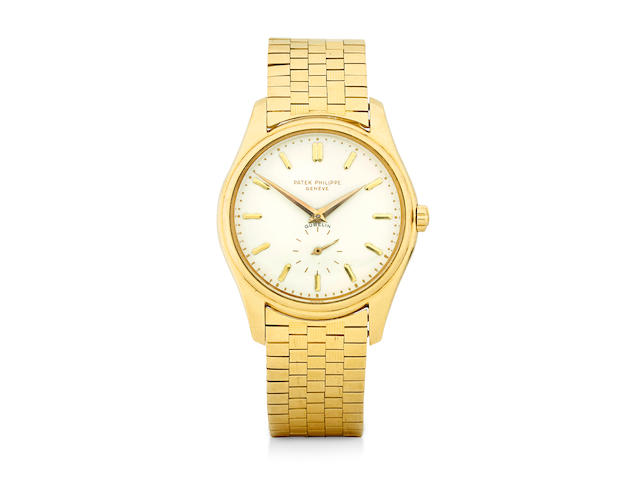 Patek Philippe. A very fine and rare 18K gold first execution enamel dial wristwatch with braceletRetailed by G&#252;belin Ref: 2526, sold November 9, 1956