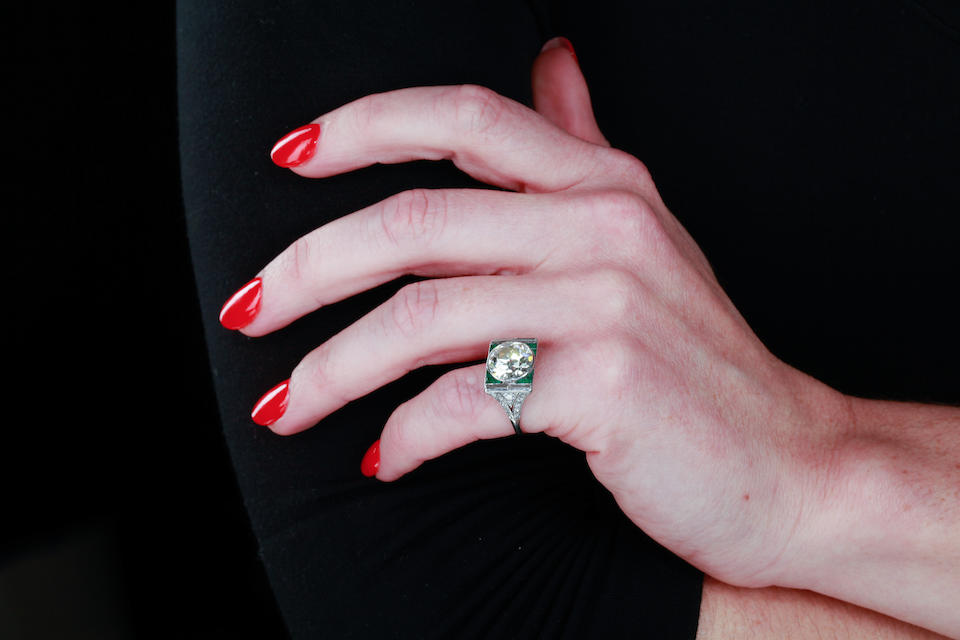 An art deco diamond and emerald ring,